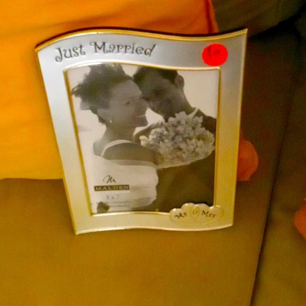 Silver wedding frame engraved with just married and Mr and mrs